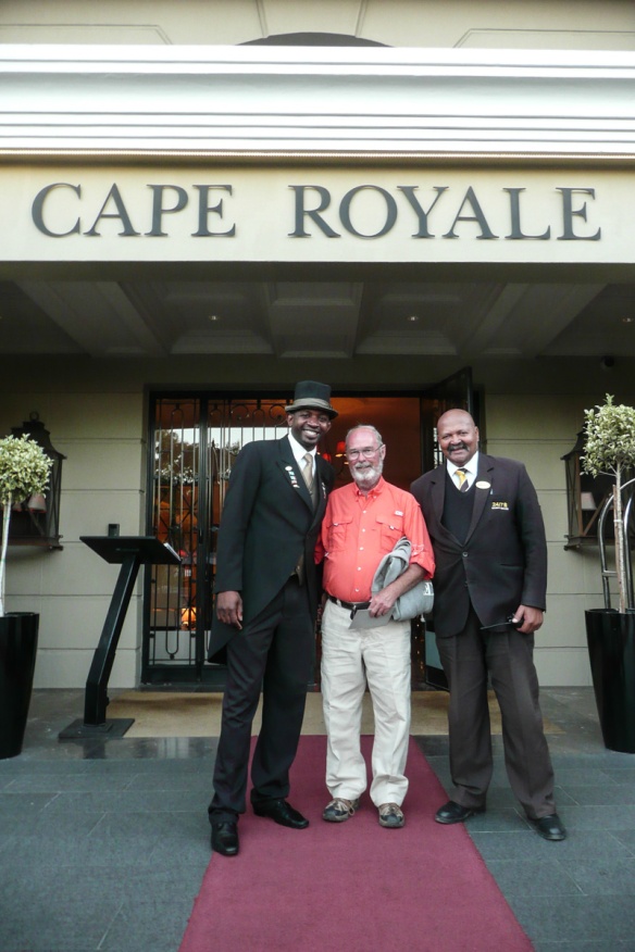 Tom Dietrich posing with the doormen at Cape Royale.